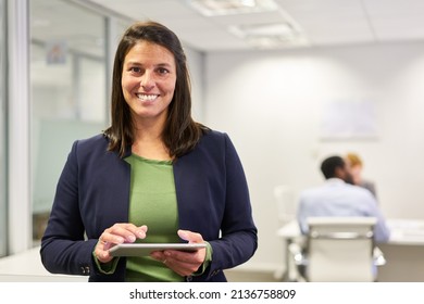 Successful Business Woman As Manager Or Startup Founder With Tablet Computer