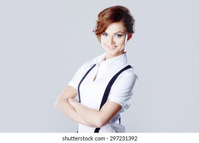 Successful Business Woman, In Shirt On White Background, Pants With Suspenders