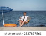 Successful businessman on summer vacations. Funny business man drink summer cocktail and using laptop in sea beach. Summer business concept. Hot summer. Crazy work. Remote online working.