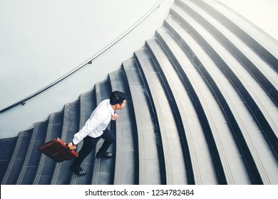 Successful Businessman Running Fast Upstairs Success Concept