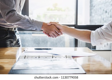 Successful of businessmen handshaking and business people after discussing good deal of trading contract, Business partnership meeting and greeting concept.