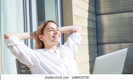 Successful Businesswoman Smiling And Enjoying Life. Independent Woman Manager Working From Home And Sunbathing On A Sunny Day At Home.