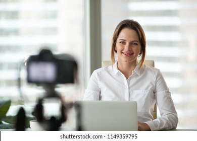 Successful Businesswoman Smiling Recording Video For Online Business Course 