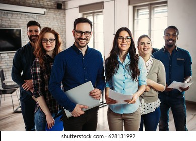 Successful Company With Happy Employees In Modern Office