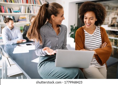 Successful company with happy workers. Business, meeting, office concept - Shutterstock ID 1779968423