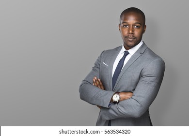 Successful Confident Black Business Man Isolated With Arms Folded Looking Strong