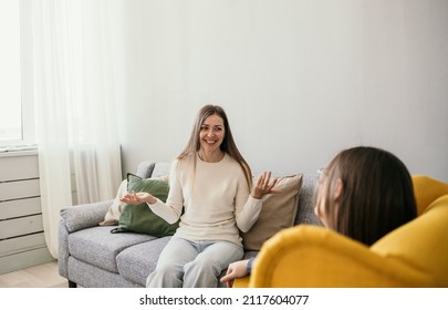 A Successful Course Of Psychotherapy. A Happy Woman Patient Tells A Psychologist About Her Successes