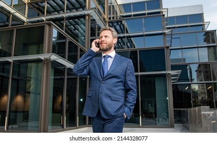 Successful Entrepreneur In Businesslike Suit Has Phone Conversation Outside The Office, Conversation