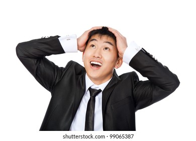 Successful Excited Asian Business Man Happy Smile Looking Up To Empty Copy Space, Handsome Young Businessman Surprise Hold Hand On Head, Isolated Over White Background