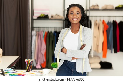 Successful Fashion Business. Smiling Black Designer Posing In Own Dressmaking Studio Or Boutique. Free Space