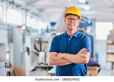 Successful foreman manager working with data and controlling work of industrial machine - Shutterstock ID 1800029602