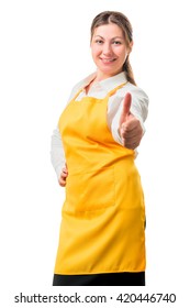 Successful Girl In Yellow Apron Smiling On A White Background