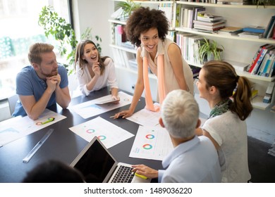 Successful group of business people at work in office - Shutterstock ID 1489036220