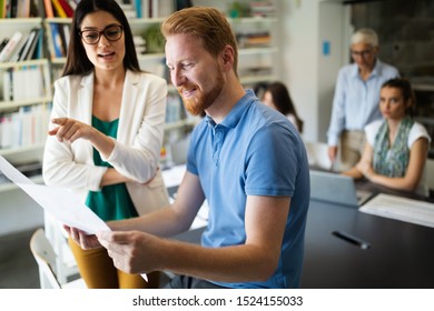 Successful group of business people at work in office - Shutterstock ID 1524155033