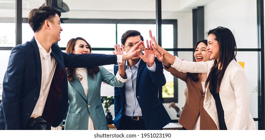 Successful Of Group Professional Business People To Win Of Celebrating Project Success.Creative Business Giving Hi Five  Good Teamwork Together At Office