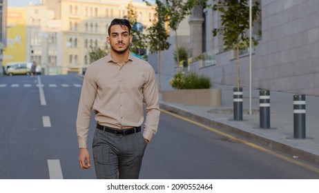 Successful Happy Handsome Hispanic Business Man Smiling Arab Guy Boss Worker Arabian Male Manager Man Tourist In Formal Clothes Walking In Street In New Old City Going Moving On Road Smile Toothy