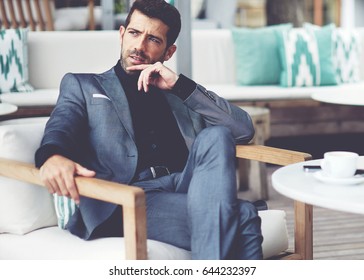 Successful Intelligent Business Man Relaxing In A Luxury Restaurant Outdoors, Confident Thoughtful Entrepreneur, Wealthy Men Pensive Rest And Waiting Someone In The Modern Coffee Shop Terrace