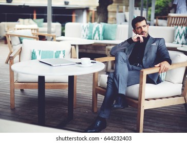 Successful Intelligent Business Man Relaxing In A Luxury Restaurant Outdoors, Confident Thoughtful Entrepreneur, Wealthy Men Pensive Rest And Waiting Someone In The Modern Coffee Shop Terrace