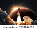 Successful launch of new space shuttle rocket with blast and smoke into space with red planet mars at sunset. Amazing spaceship with astronauts takes off to Mars in starry sky