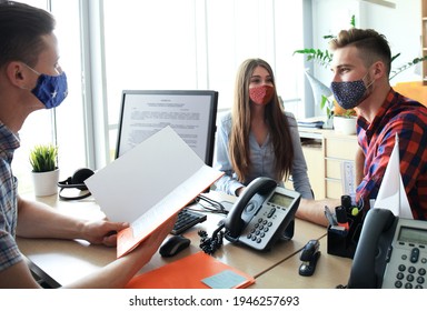 Successful Lawyer In Protective Mask Giving Consultation To Family Couple About Buying House.