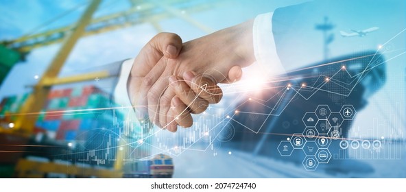 Successful logistic and transportation deal. Businessmen handshake for business partnership, import export global network distribution, shipping freight and smart delivery service.