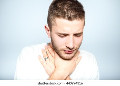 Successful Man With Strep Throat, Isolated On A Gray Background