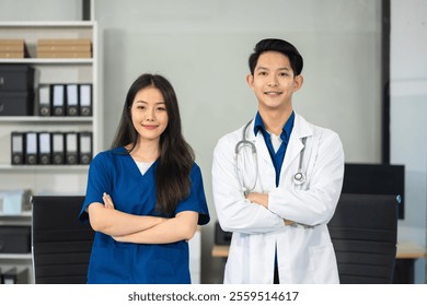 Successful medical team thumbs up to show success and motivation. - Powered by Shutterstock