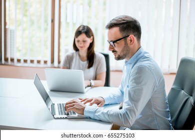 Successful office workers - Shutterstock ID 655275103
