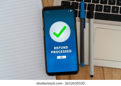 Successful refund process notification on smartphone app. Concept of getting your money back.