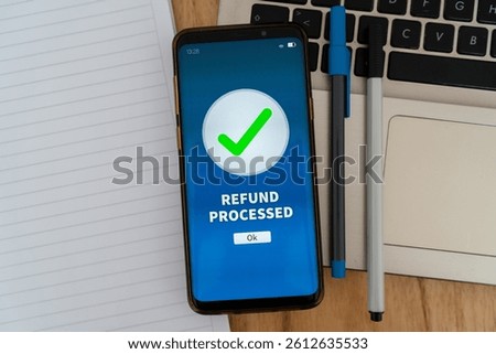 Successful refund process notification on smartphone app. Concept of getting your money back.