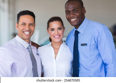 Successful Sales Staff At A Car Dealership