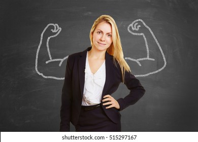 Successful self confident businesswoman with fake muscles made of chalk