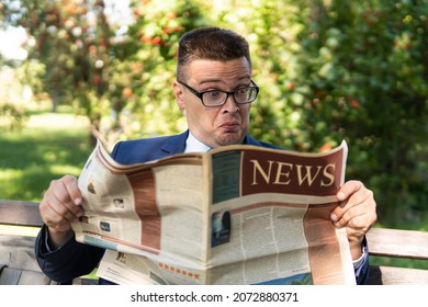 Successful senior businessman reading a financial newspaper while sitting in city square, outdoors. surprised person reads fake news. emotion of surprise and shock, concept - Powered by Shutterstock