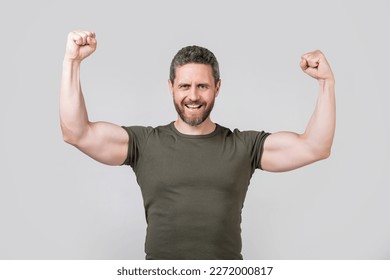successful strong muscular man isolated on grey background. strong muscular man - Shutterstock ID 2272000817