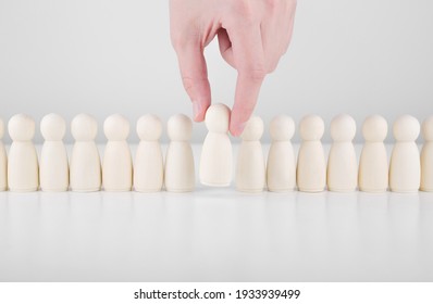 Successful Team Leader. Businessman Hand Choose People Standing Out From The Crowd. Human Resources And CEO Concept