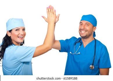 Successful Team Of Surgeons Giving High Five And Laughing Isolated On White Background