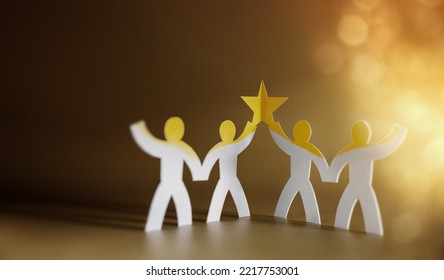 Successful Teamwork Concepts. Paper Cut as Group of Worker Raise Up a Star Together. Business Strategy. Working to Committed and Towards a Shared Goal. Colleagues or Partnership Celebrating a Success - Shutterstock ID 2217753001