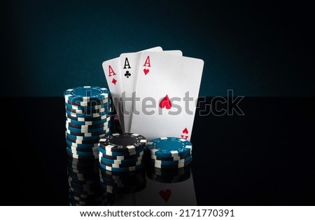Successful win with three aces playing cards. Poker game with three of a kind or set combination.