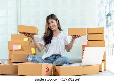 Successful Woman Entrepreneur With Parcel Boxes In Her Own Job Shopping Online Business At Home