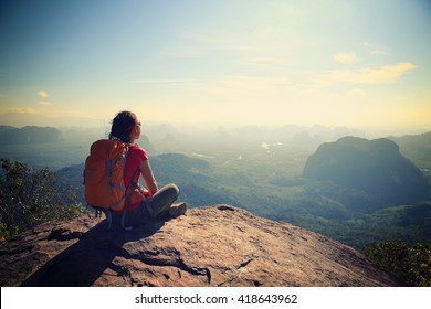 Successful Woman Hiker Enjoy The View At Sunrise Mountain Peak Cliff Edge