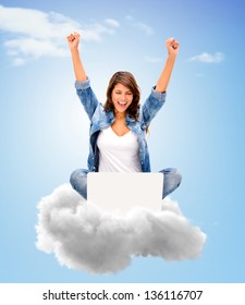 Successful woman using cloud computing with her laptop