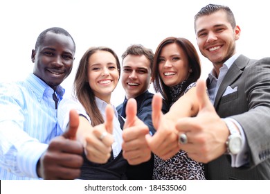 Successful Young Business People Showing Thumbs Up Sign 