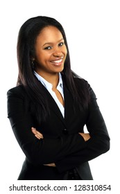 Successful young business woman with hands folded smiling over white background