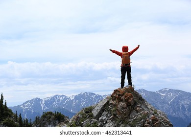 On Edge Rocky Cliff Man Raises Stock Photo (Edit Now) 709483576