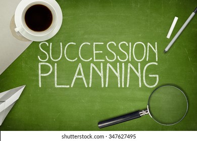 Succession Planning Concept On Blackboard With Pen