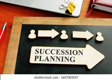 Succession Planning Concept. Wooden Figures And Arrows.