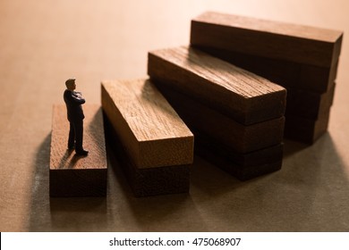  Successive Business Concept.Businessmen Thinking On First Step Of Wood Stair.