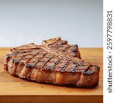 A succulent T-Bone steak beautifully grilled, showcasing its perfect char and juicy texture, ideal for steak lovers and culinary enthusiasts.