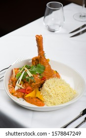 Succulent Yummy Lamb Shank Curry Served With Pilau Rice