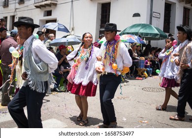 Sucre, Bolivia - February 2020: Traditional carnival parade with band music and dancers 